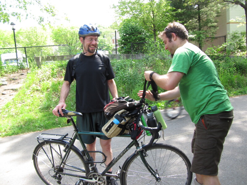 Dogi tries to load Adam's bike with his 'Gundam' gear