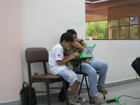 Albertito, our youngest volunteer, helping one of our trainers